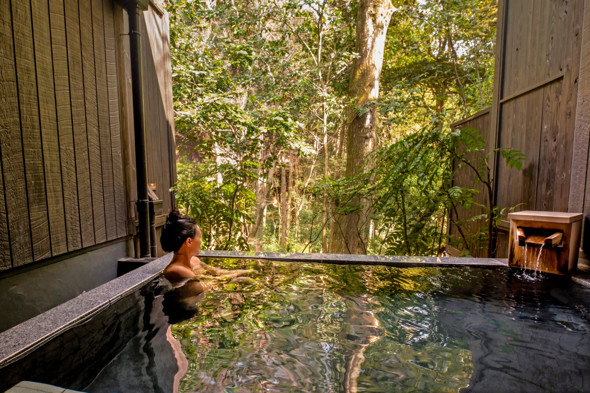 A woman relaxing in an Onsen in Japan.